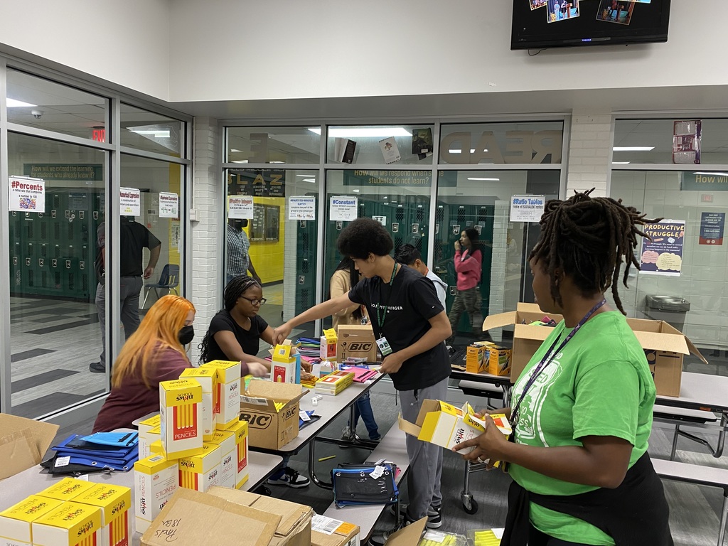 Mills Middle Students setting up for binder roll out